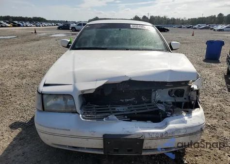 2003 Ford Crown Vict из США, поврежденный, VIN 2FAFP71H93Y142280